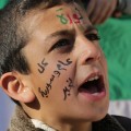 20-فتى في المظاهرة يهتف بحماس (Medium)