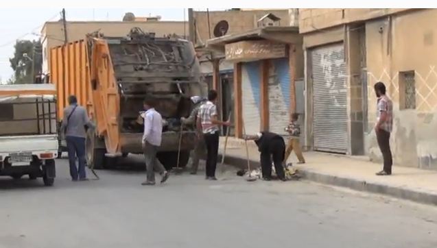 Workers from the Tal Abyad Local Council clean the streets - YouTube