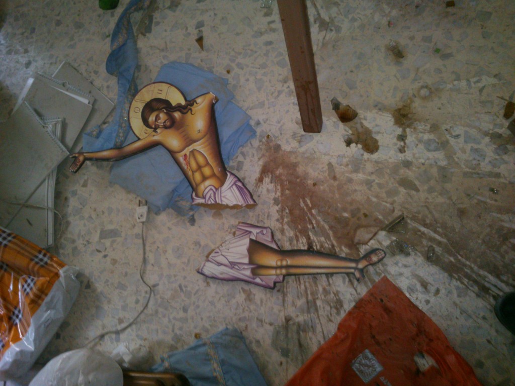 A broken icon inside the Harasta church. Photography by Razan Zeitouneh