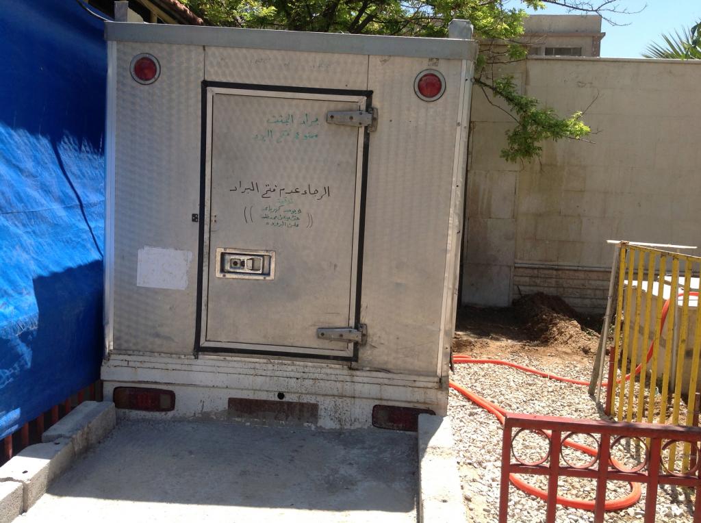 An ice cream truck was turned into makeshift morgue - Photography by Razan Zeitouneh