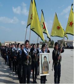 Democratic Union Party female fighters parade in the province of Hasaka. Credit: Democratic Union Party official website