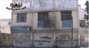A school damaged by rocket-fire in Al-Sbaina, south of Damascus. Credit: YouTube