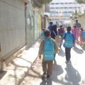 Young students on their way out of school in Raqqa. Photography by Abdel Karim Jaafar.