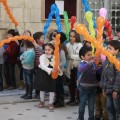 The children wait for the beginning of the festivities.