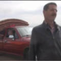 A resident of Khan Shaykhoun in Idlib province flees the fighting - YouTube/Orient News
